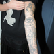 Illustration for article titled Justin Biebers Tattoos Documented by the Miami PD: A Visual Analysis